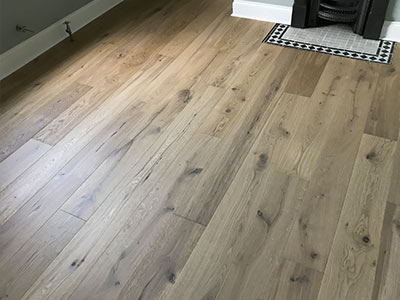 Engineered wood floor fitting in Lambourne End