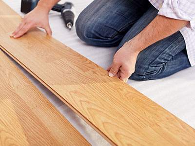 Laminate floor fitting